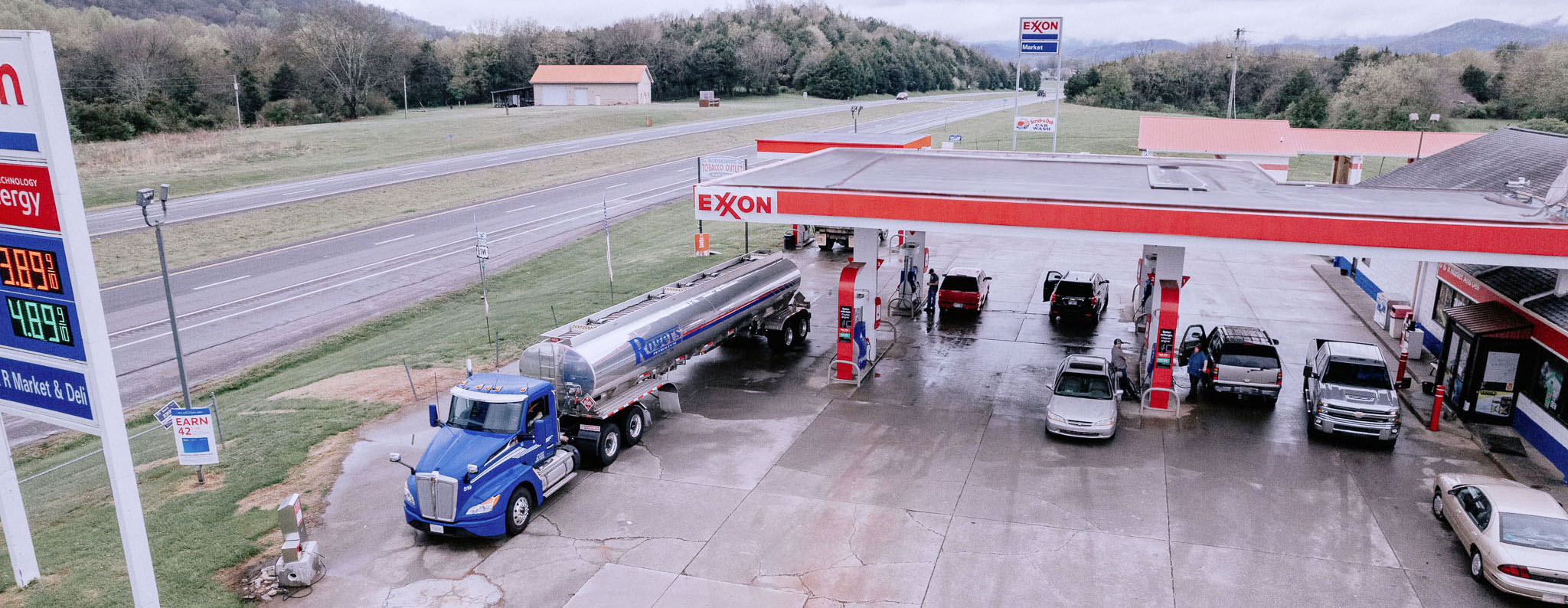 Rogers Petroleum delivering to an Exxon Gas Station